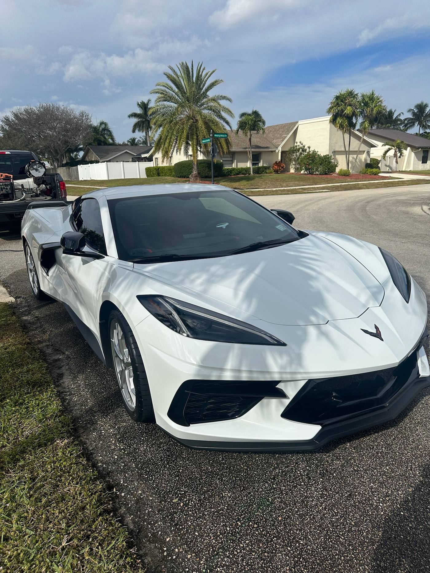 White Chevrolet Corvette C8 after full mobile detail, street parked